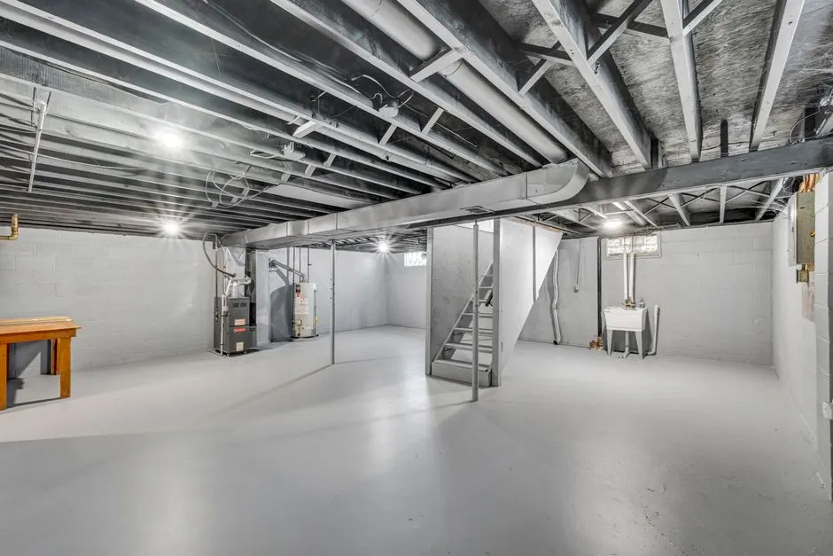 Explore this spacious unfinished basement perfect for renovation in an Ohio home.